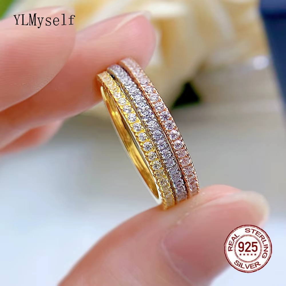 Gold-tone stackable 925 silver rings with clear stones