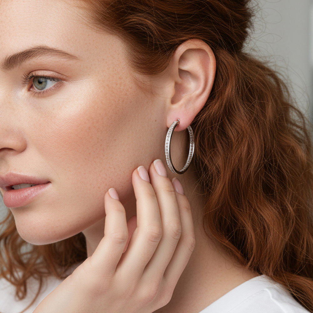 Model wearing 925 silver hoop earrings