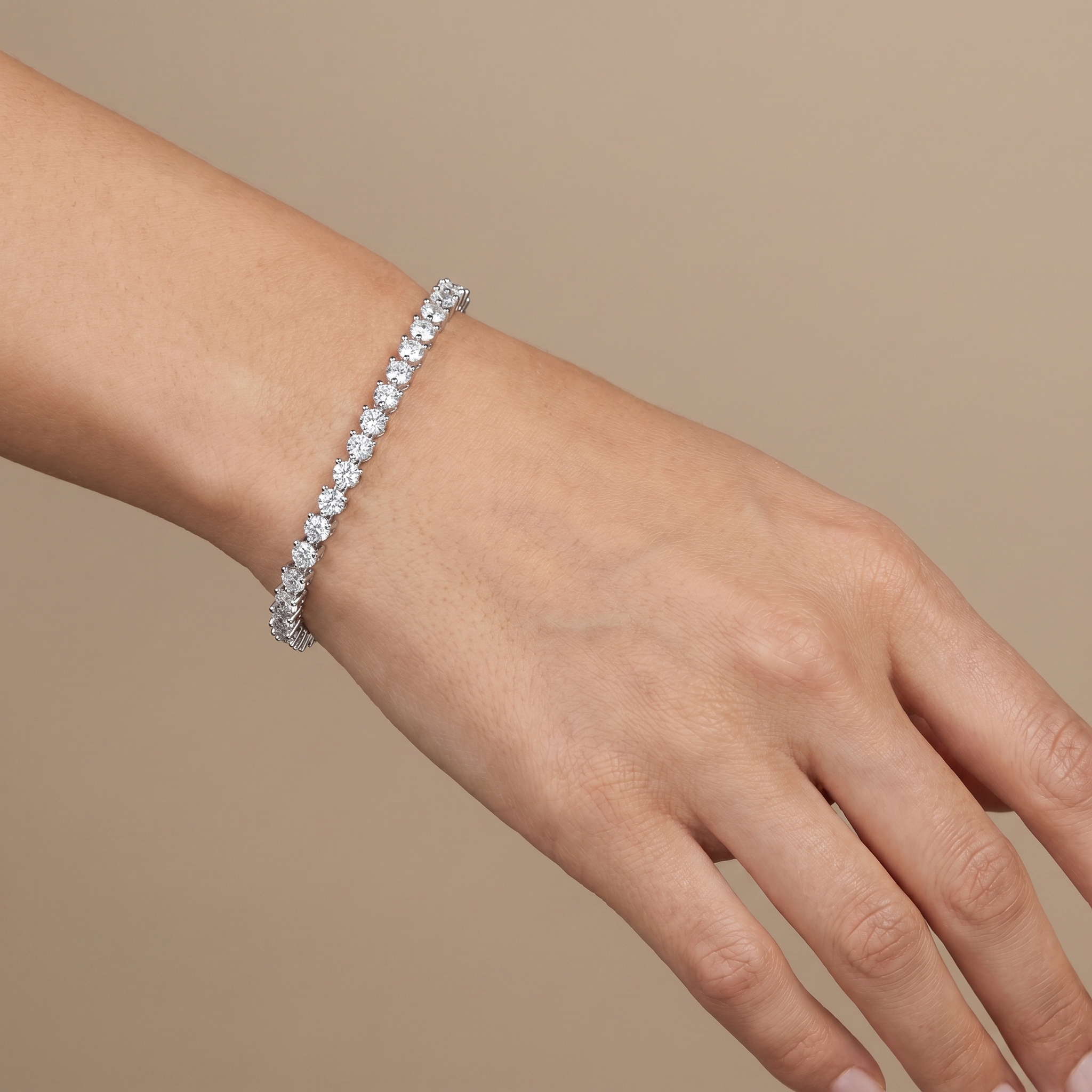 Moissanite 925 silver bracelet worn on a wrist
