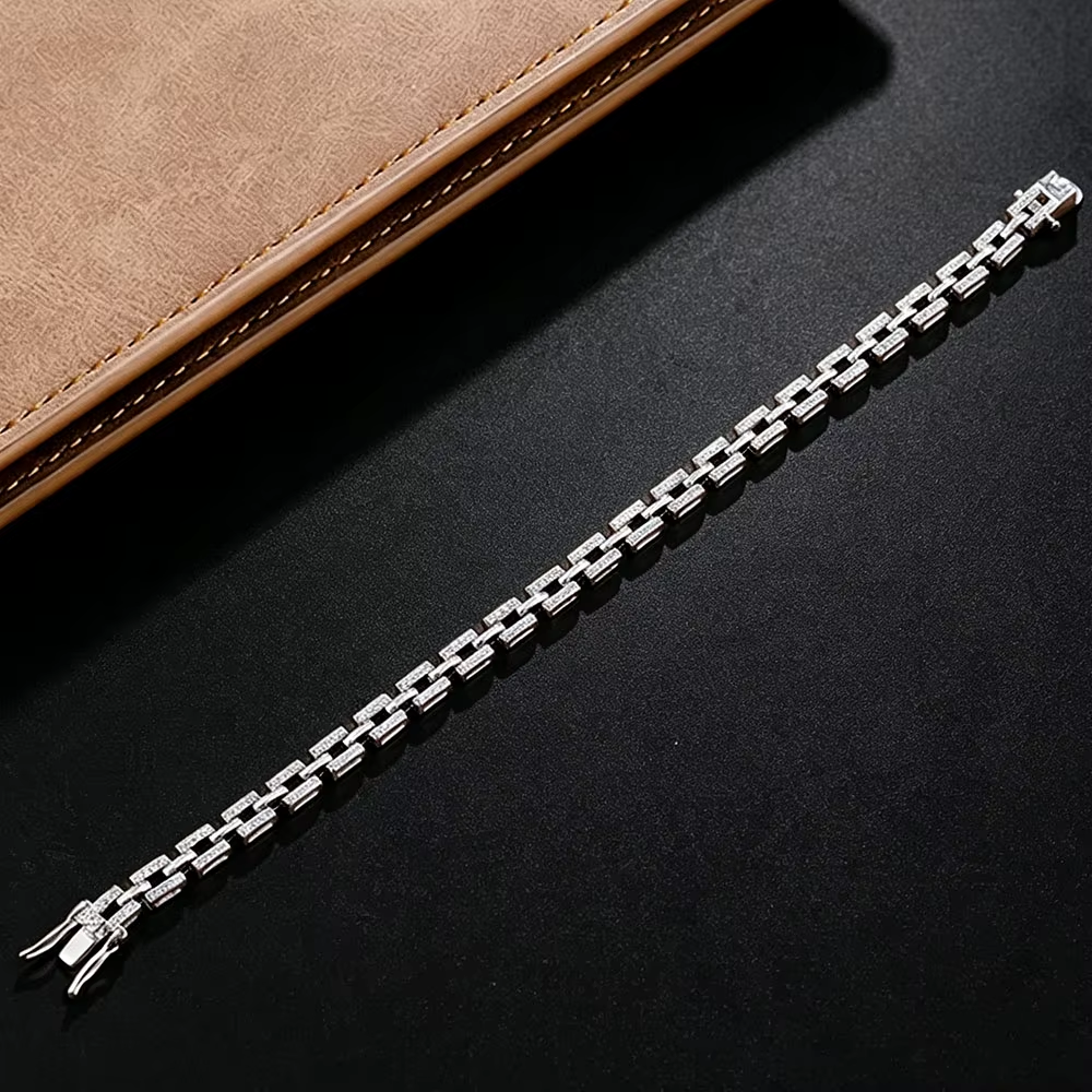 Moissanite 925 silver chain detail on dark surface